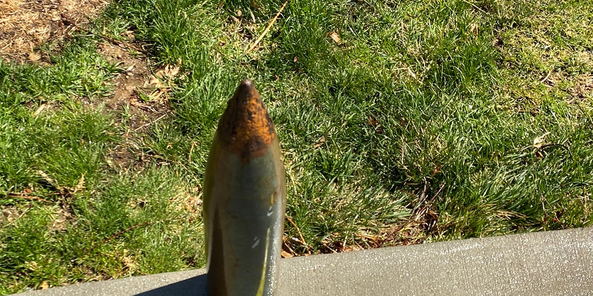 Landscape work unearths buried military shell at Omaha residence