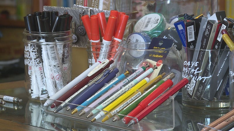 A store on the brick main street of Ashland in Saunders County, encourages customers to put...