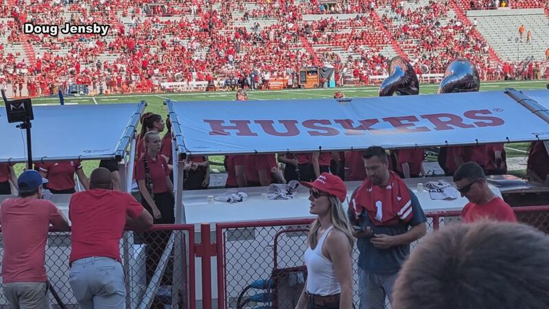 Canopies now line the Husker sideline of Memorial Stadium, shielding players from the elements...