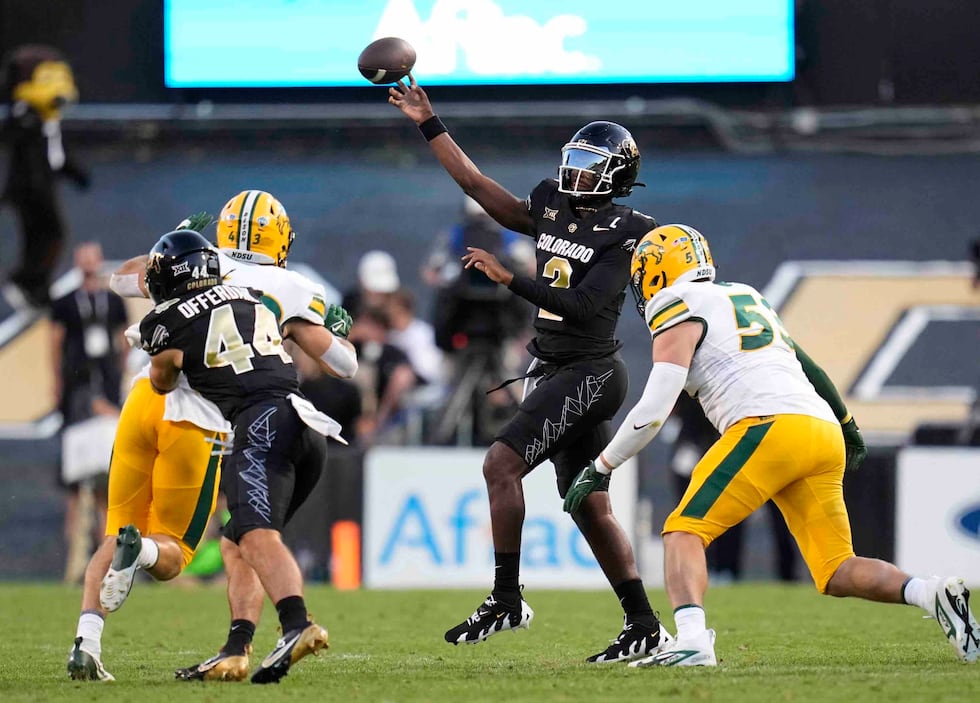 Colorado quarterback Shedeur Sanders passes during the first half of an NCAA college football...