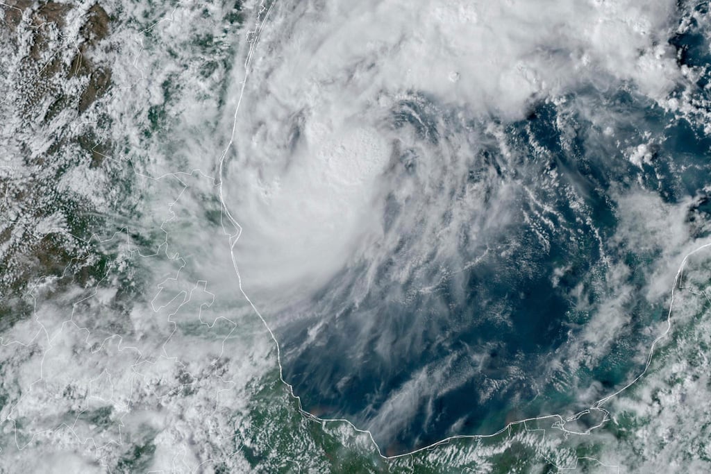 This GOES-16 GeoColor satellite image taken at 4:50 p.m. EDT and provided by National Oceanic...