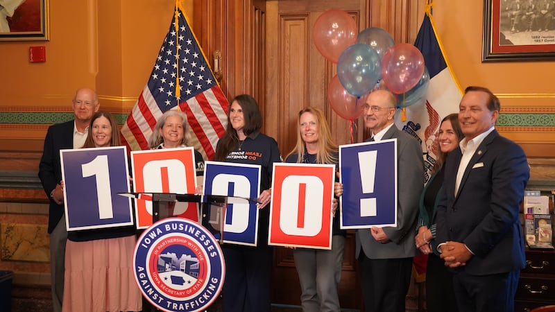 Supporters of Iowa Businesses Against Trafficking Advisory Group announce the first 1,000...