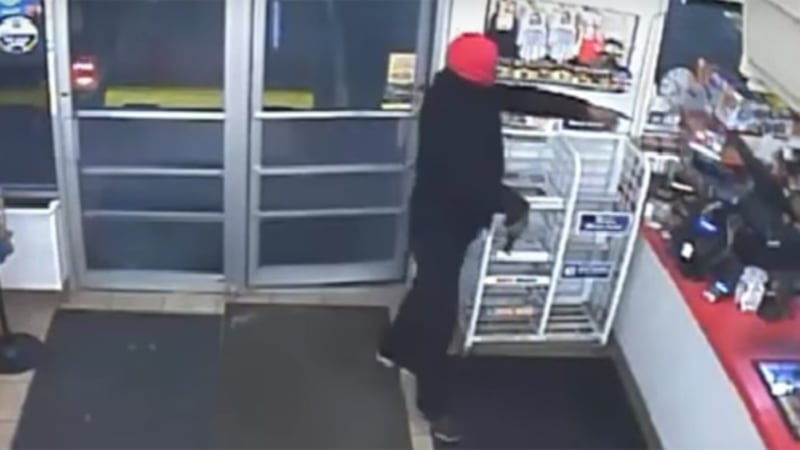 Surveillance video puts armed robber in convenience store spotlight