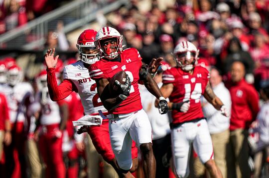 Wisconsin cornerback Ricardo Hallman (2) returns an interception 95-yards for touchdown as...
