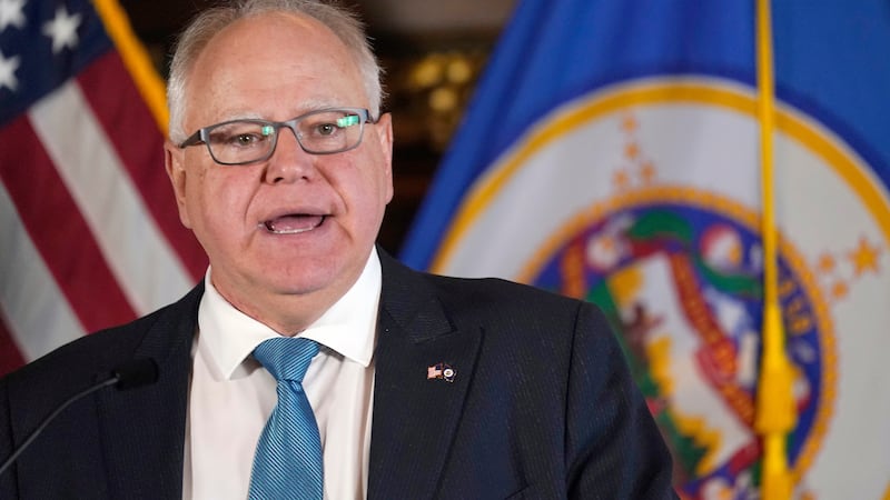 FILE - Minnesota Gov. Tim Walz speaks to the media, Nov. 9, 2022, in St. Paul, Minn.