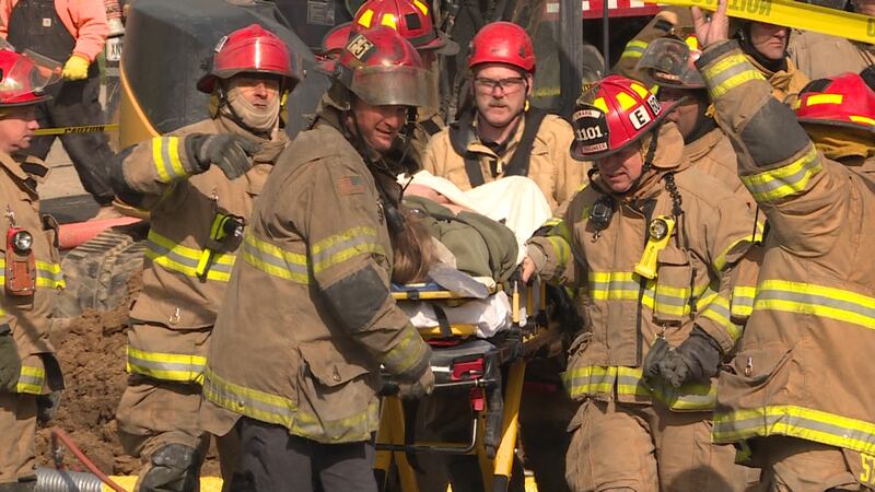 Snatched Rescue Fire crews describe life-threatening rescue to free trapped utility worker