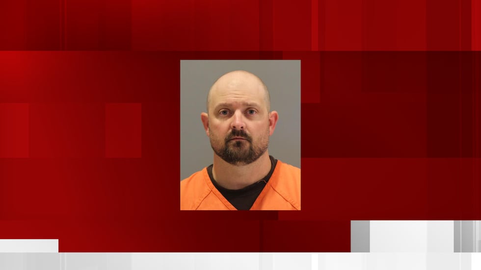 Douglas County authorities arrest Bellevue Police officer on charges of domestic violence, child abuse – WOWT