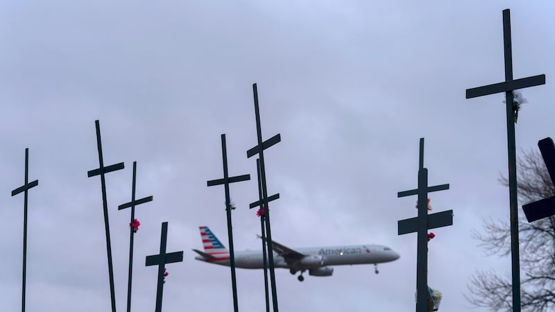 An American Airlines plane prepares to land at Ronald Reagan Washington National Airport as...
