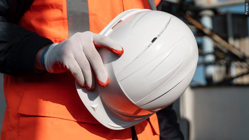 Construction worker and hardhat