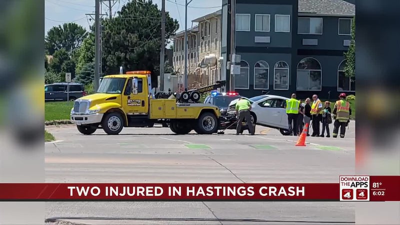 The driver of the white vehicle was issued a citation for failure to yield at the stop sign.