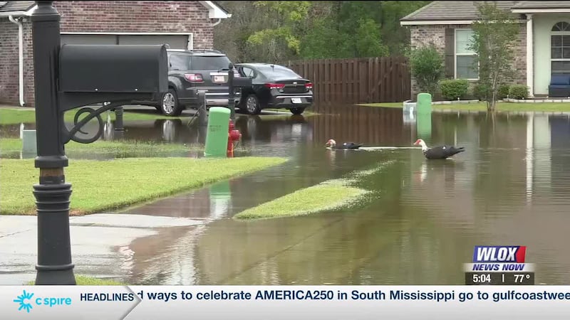 Floodwaters swamped St. Martin and Ocean Springs neighborhoods, prompting calls for...