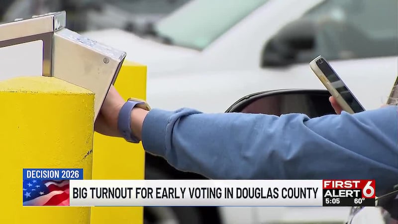 Long lines formed outside the Douglas County Election Commission office today for early...