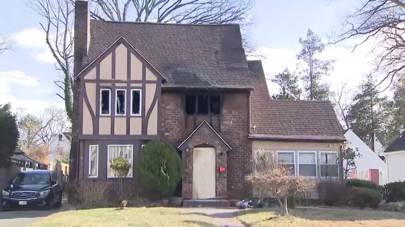 Two sisters died in a Thanksgiving house fire while helping their father escape.